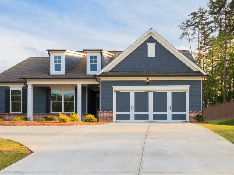 How Does A Cement Driveway Replacement Enhance My Home?